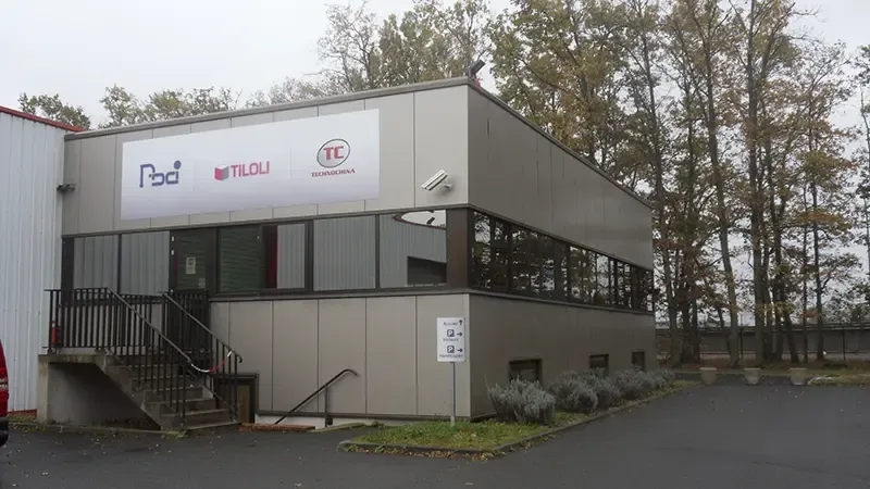 PDCi building in Saint-Cyr-en-Val, with PDCi, Tiloli and Technochina signs on the front