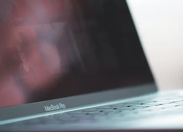 Close-up of a laptop’s screen and keyboard
