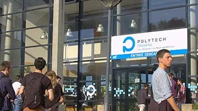 Entrance of the Polytech Orléans school, students in front of the glass building